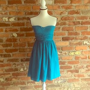 Woman’s Turquoise Cocktail Dress